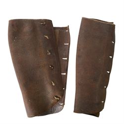 Collection of 20th century military related items, including leather gaiters, field binoculars, canvas bag, spurs 