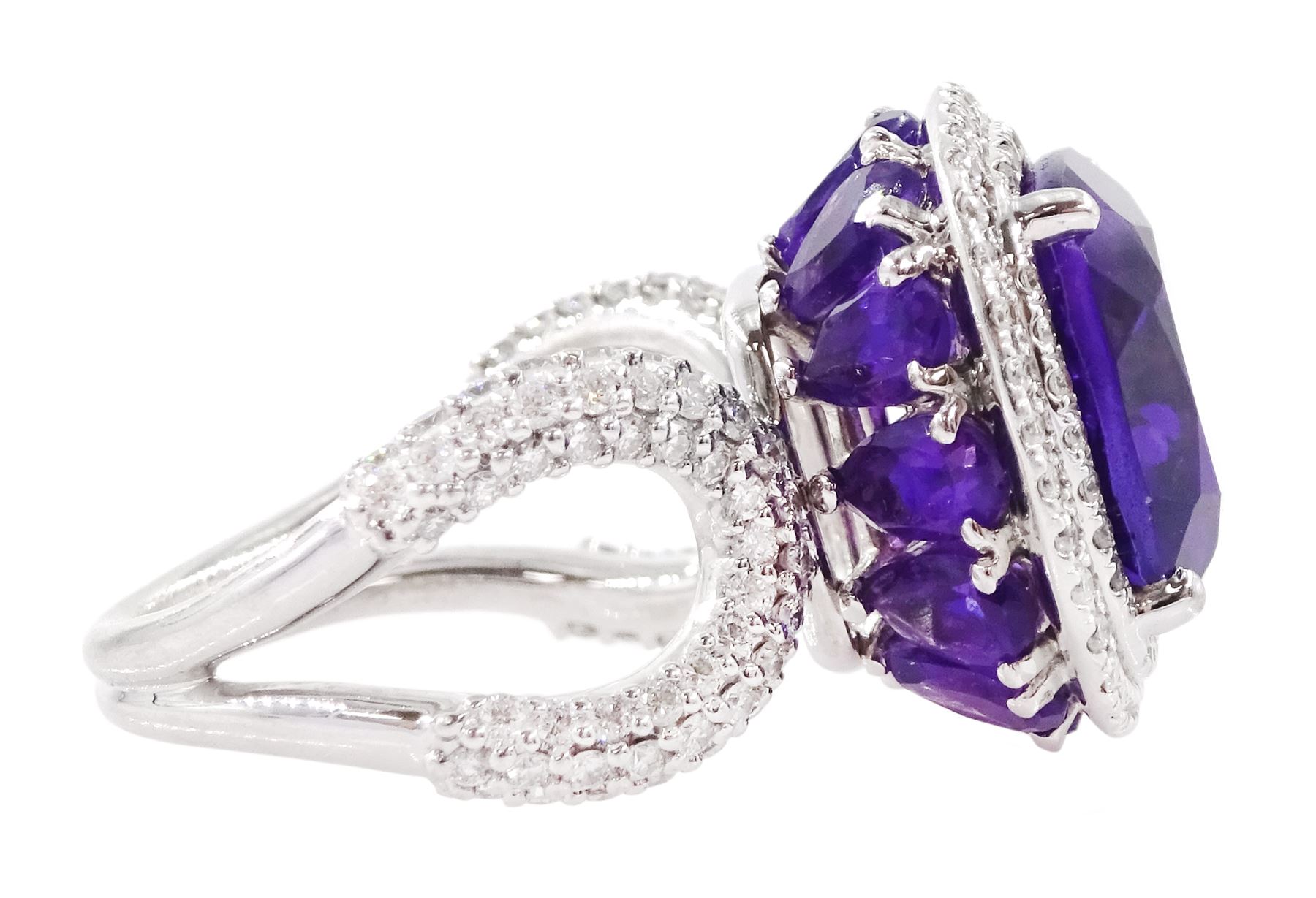 Damas 18ct white gold amethyst and diamond Vera ring, the central square cushion cut amethyst of 6.28 carat, with round brilliant cut diamond surround, pear cut amethyst gallery and diamond set shoulders, total amethyst weight 15.48 carat, total diamond weight 1.10 carat, with certificate