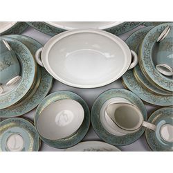 Royal Doulton De Lamerie pattern part tea and dinner service, including eight dinner plates, seven side plates, seven bowls, two serving platters, seven cups and saucers, milk jugs, sucrier, etc (58)