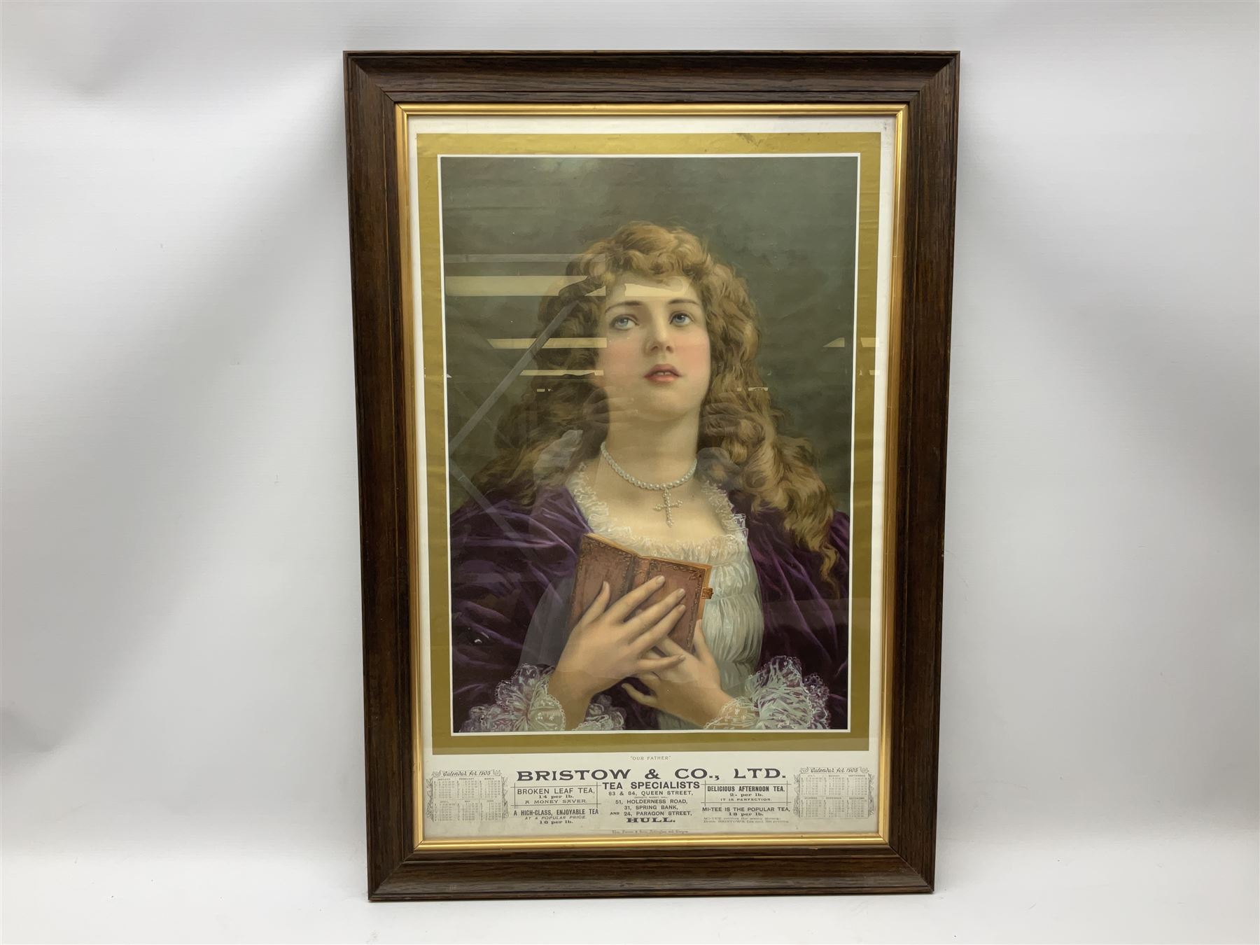 Edwardian shop advertising calendar for Bristow & Co. Ltd Tea Specialists of Hull 1905 depicting a half length portrait of a pensive young lady entitled 'Our Father', 73 x 47cm, oak and gilt frame and After J Stead (British 20th century): 'Bird's Eye View of the Town of Kingston-upon-Hull', reproduction lithograph pub. 1990, 49cm x 87cm (2). NOW UNFRAMED. 