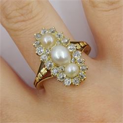 19th century gold diamond and pearl ring, three pearls in a foil backing, with old cut diamond surround