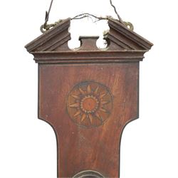 Three mahogany wheel barometers, each with silvered dial, thermometer and hygrometer, two with inlaid decoration, one with architectural pediment and one with swan-neck pediment 