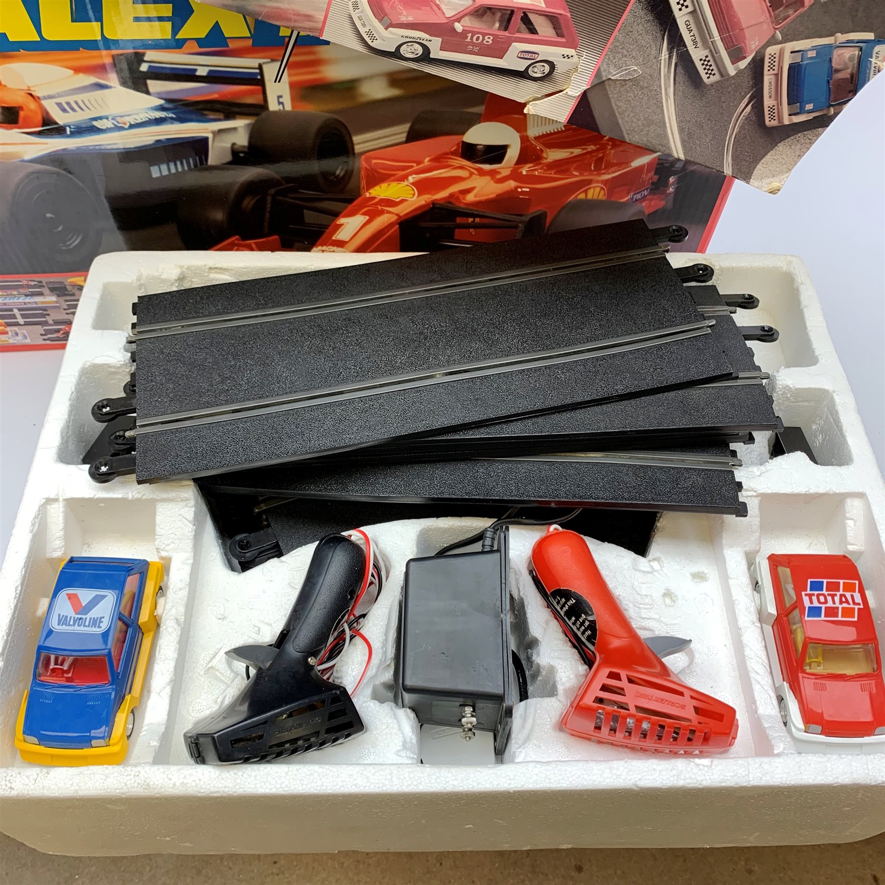 Scalextric - Formula One set and Mighty Metro set, both boxed; two boxes of extra track; and box of Race Tuning Accessories