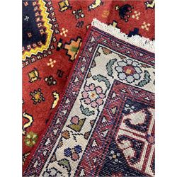 Small Persian Abadeh rug, blue ground with red lozenge field decorated with small bird and plant motifs, triple band border with floral design