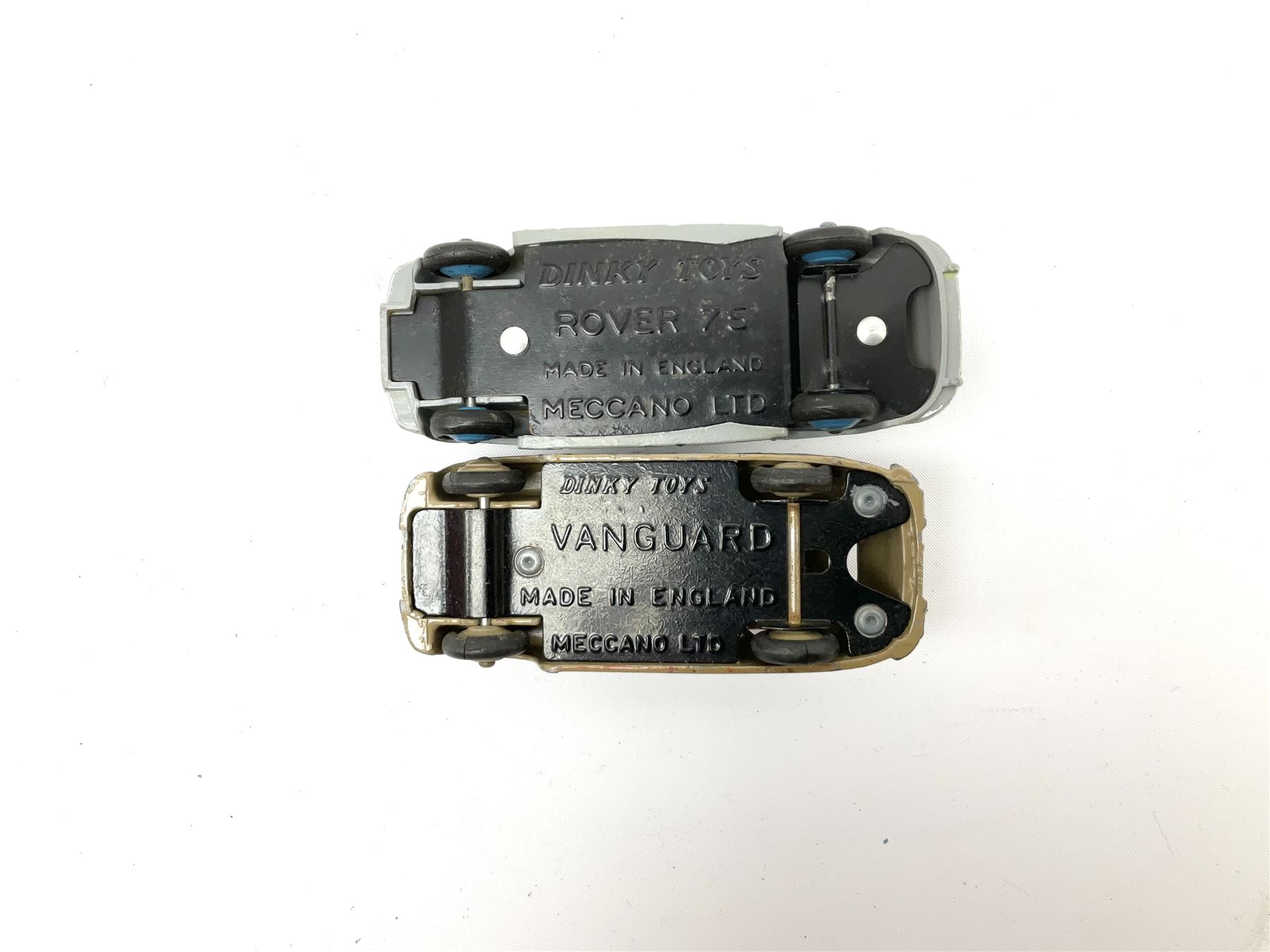 Dinky - seven unboxed and playworn die-cast cars comprising Studebaker, Ford Sedan, Rover 75, Vanguard, Austin Somerset and two Austin Devons; together with two Dublo size scale cars (9)