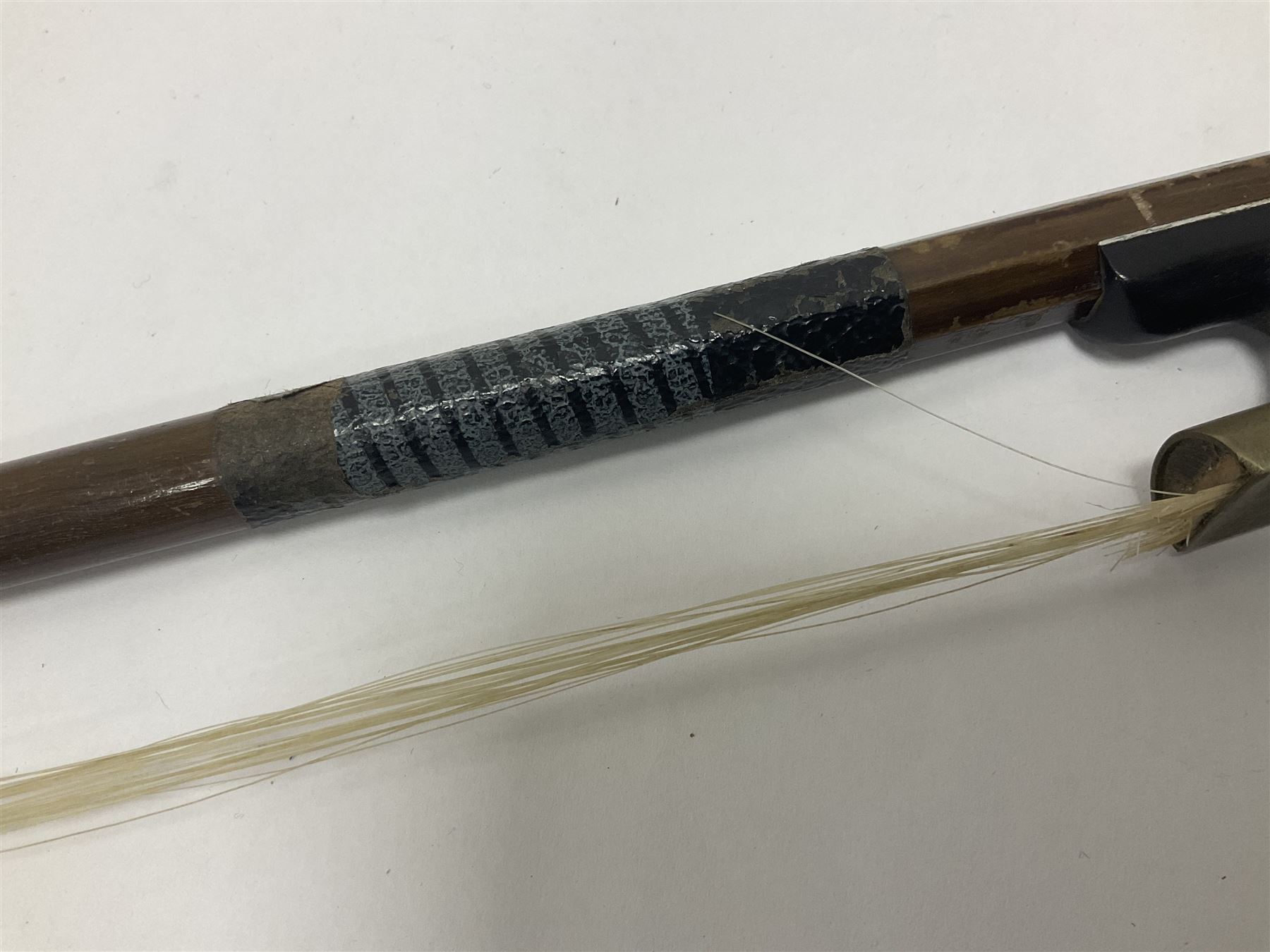 Wooden double bass bow with a mother of pearl inlay to the frog Length 71cm