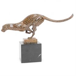 Bronze two toned figure of running cheetah, upon a rectangular marble base, signed and wit...