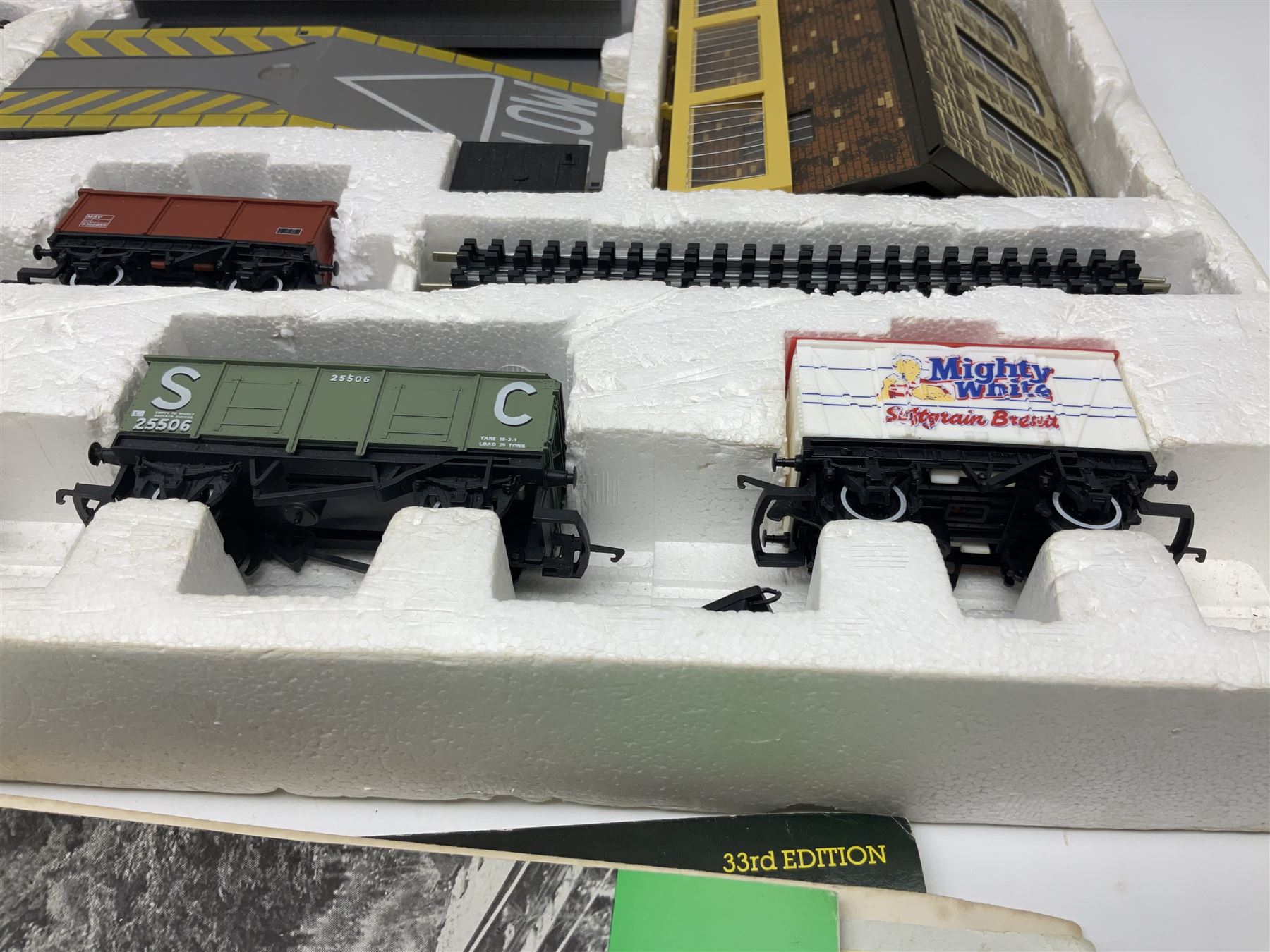 Hornby '00' gauge - Midnight Freight electric train set with Class 58 diesel Co-Co locomotive No.58001, eight wagons, goods shed, track, car loading ramp and power controller etc; boxed with paperwork; together with an additional wagon, figures and platform fencing