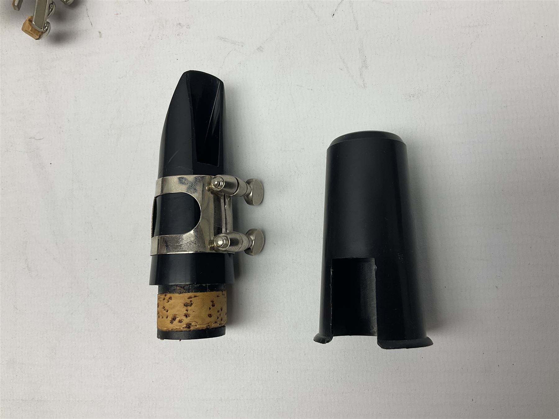 Windsor five-piece clarinet, serial no.EK05580; and Selmer Console clarinet with B&H mouth-piece; both cased (2)