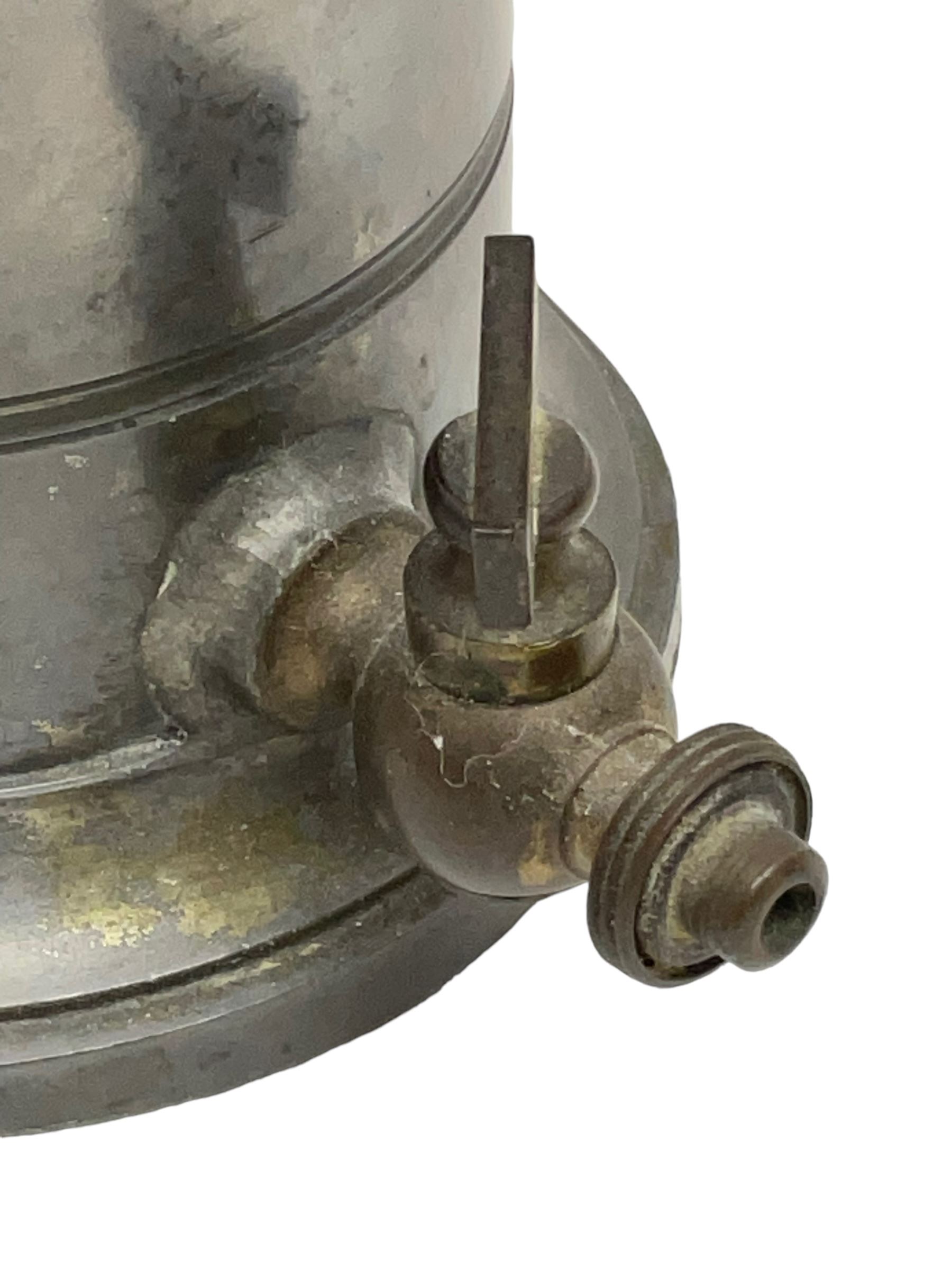 French metal irrigator by Jeannie Paris, and marked Veritable Irrigateur system de eguisier, H23cm