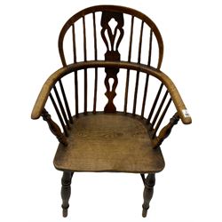 19th century elm and ash Windsor armchair, low hoop and stick back with shaped and pierced splat, raised on turned supports joined by H stretcher 