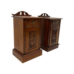 Pair Victorian style hardwood bedside cabinets, fitted with single drawer and cupboard, the doors carved with floral urns, on plinth bases