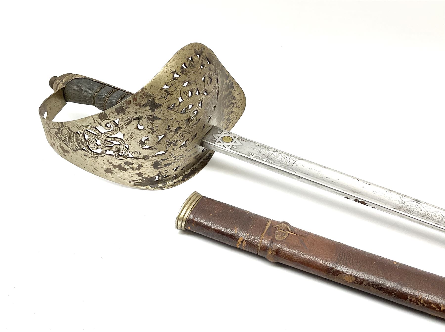 George V 1897 pattern army officer's sword the 82.5cm etched blade by Flights Ltd London, Winchester, Aldershot & Camberley, nickel plated pierced hilt and wire bound fish-skin grip, in leather scabbard, L101cm overall