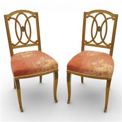 Edwardian pair of satinwood side chairs, each with shaped crest rail above an intertwining...