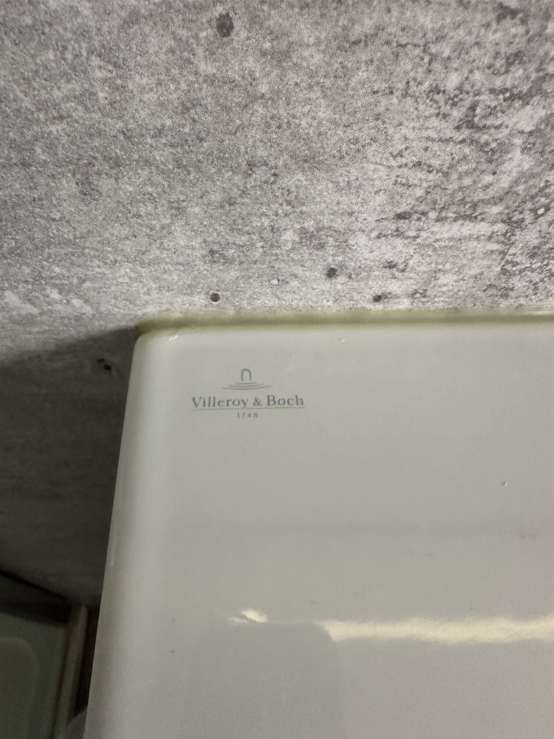 Villeroy & Boch vanity unit, ceramic hand basin with Hansgrohe mixer tap on two drawer wall mounted unit in gloss grey finish L101cm D47cm H58cm. Complete with Duravit illuminated wall mounted mirror in white frame 100cm x 70cm