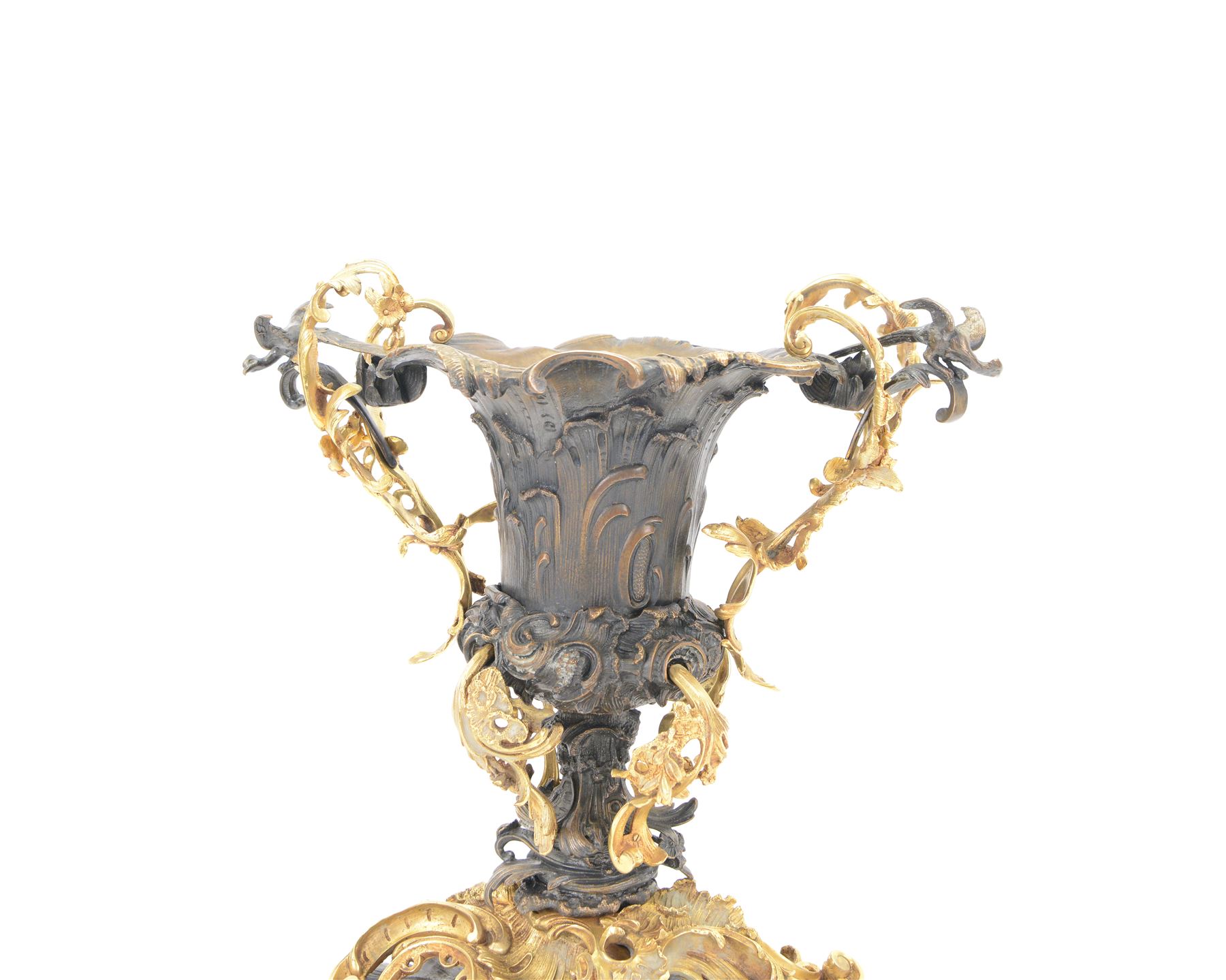 After Henry Dasson (1825-1896): large French gilt bronze urn, the body of typical form and cast with C scrolls, with twin curved gilt foliate handles detailed with birds, upon a scrolling foot, and naturalistically cast base, impressed HENRY DASSON to foot, H50.5cm W48cm