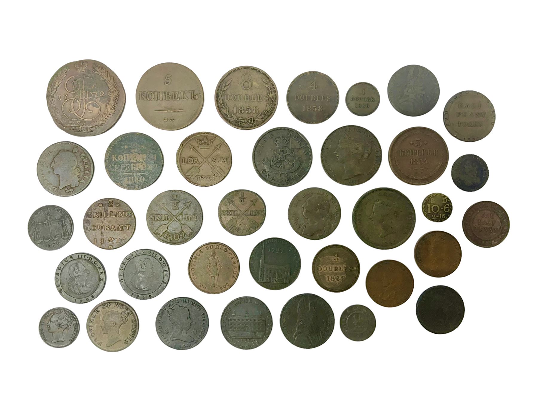 Thirty six late 18th century and onwards United Kingdom and World coins and tokens, to include 1772 Catherine II 5 Kopecks, Swedish quarter and half Skilling pieces dated 1809 and 1806, two Skilling Courant piece dated 1810, 1831 Isle of Man half penny token etc 
