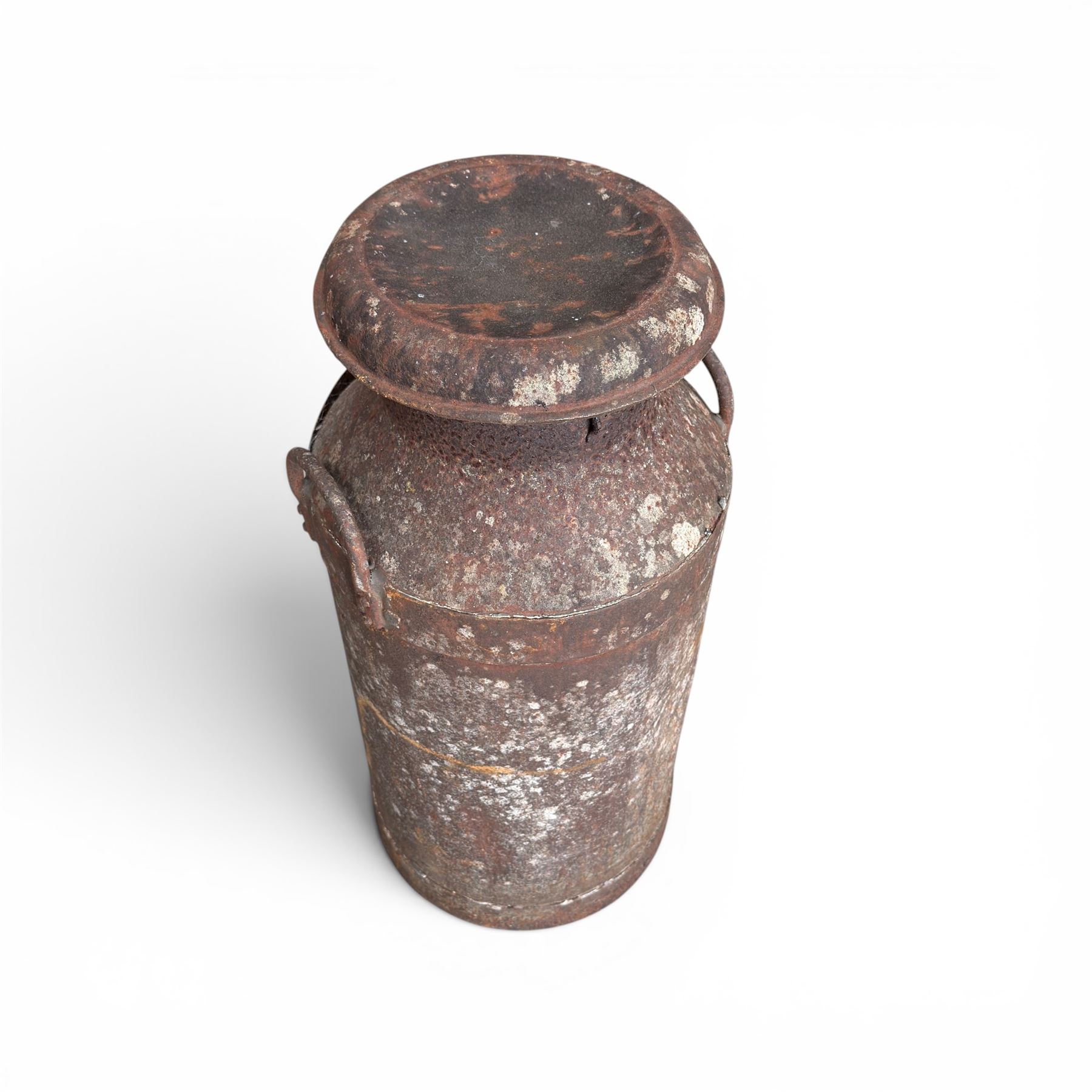 19th century milk churn with weathered patina along with aluminium watering can