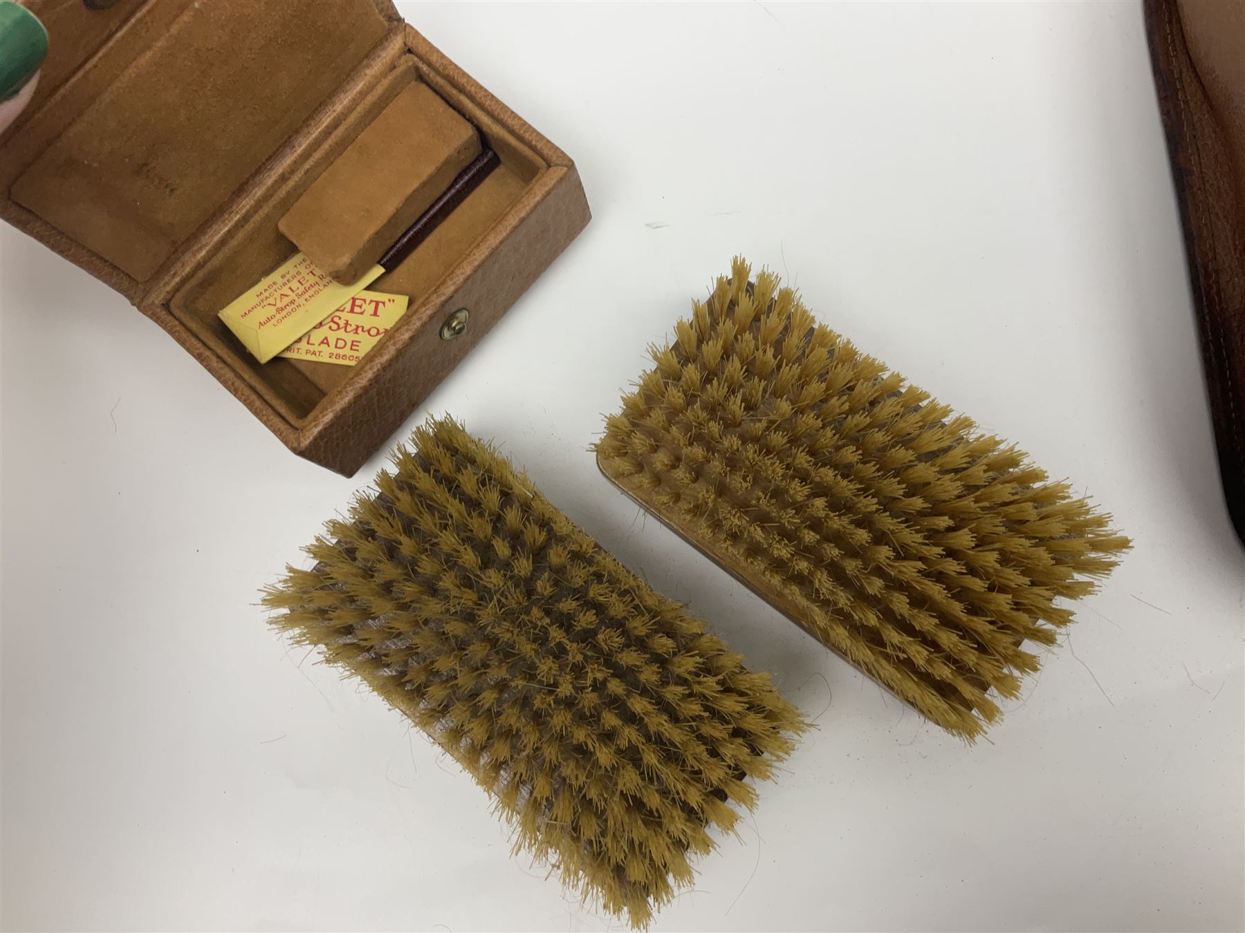 Mappin & Webb leather cased campaign gentleman's vanity set, the tan leather case opening to reveal fitted interior with five engine turned silver capped glass vanity bottles, hallmarked Mappin & Webb, London 1944, brushes, mirror etc, monogram DPK to the top of the case