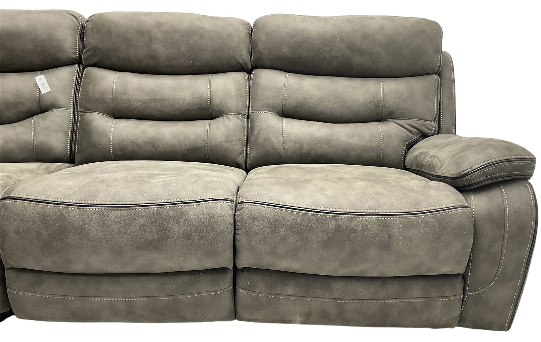 Large contemporary reclining corner sofa, upholstered in gunmetal grey faux suede fabric with black piping