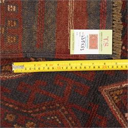 Afghan Meshwani runner, hand-knotted wool pile, indigo ground decorated with a vertical series of angular diamond medallions in tones of madder red, dark blue, framed by geometric borders with flatwoven kilim ends with fringe