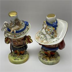 Pair of limited edition Royal Crown Derby Golden Jubilee Mansion House Dwarfs, Tall and Low Dwarf, dressed in Royal Guard uniform, H18cm, exclusive to Mulberry Hall 35/50, each with printed mark beneath, and signed M.E.Reynolds and J Morrison, with makers box. 