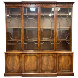 Bevan Funnell - Georgian design mahogany breakfront bookcase, moulded dentil and arcaded frieze over four astragal glazed doors, four cupboards below enclosed by figured doors, on skirted base