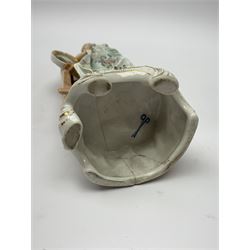 A group of five Continental figurines modelled as the arts, emblematic of music, painting, sculpture, literature, and theatre, each with spurious blue cross mark beneath, H22.5cm. (5). 