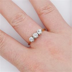 18ct gold three stone transitional cut diamond ring, stamped, total diamond weight approx 0.80 carat