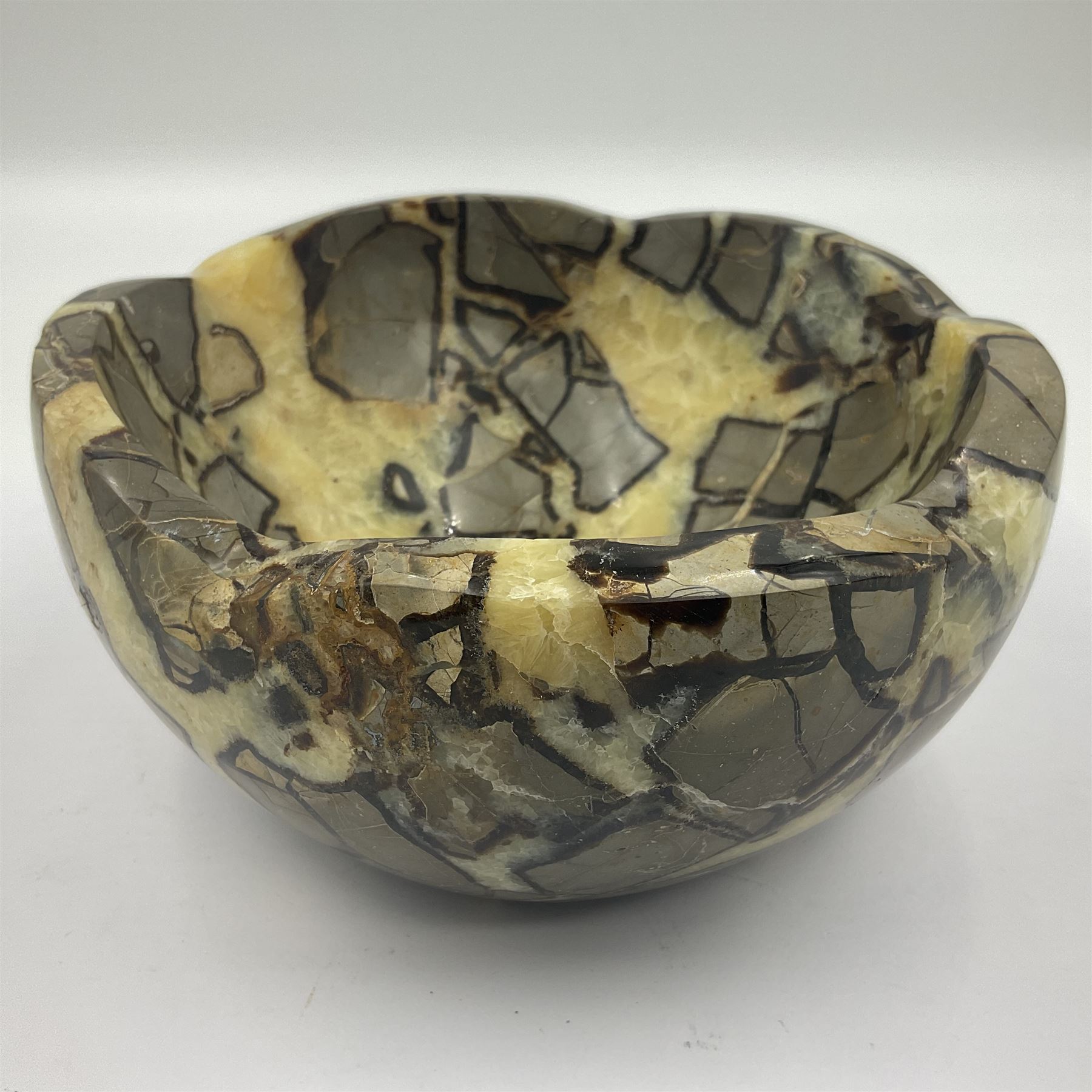 Polished septarian bowl, with a calcite and siderite within limestone rock, D16cm H8cm