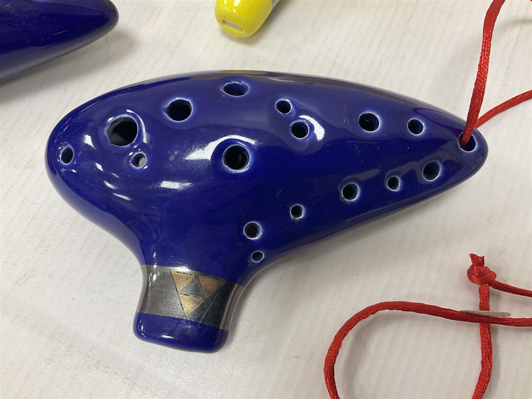 Four ocarinas three 10 hole ocarinas and one 16 hole double ocarina, three of which being from the Legend of Zelda franchise 
