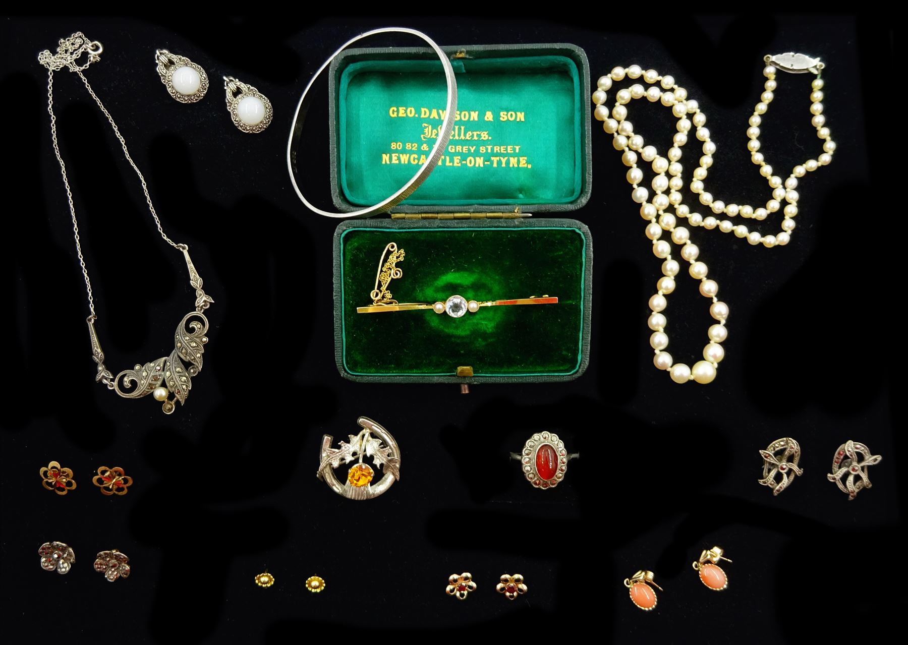 Early 20th century gold aquamarine and pearl brooch, stamped 15ct, four pairs of 9ct gold stud earrings including garnet and coral, silver engine turned bracelet by Charles Horner, single strand pearl necklace and silver stone set jewellery