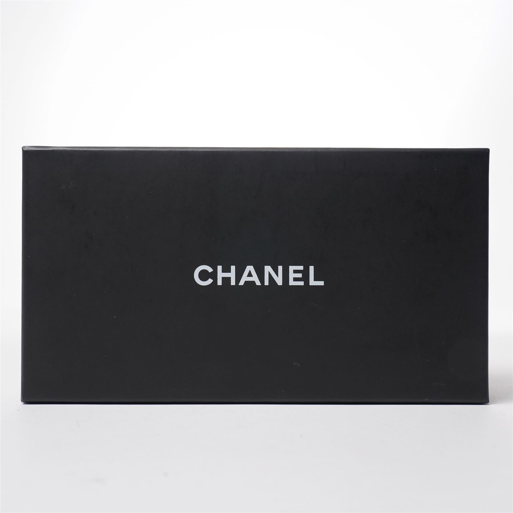 Chanel - pair of oversized sunglasses, with translucent tortoiseshell-effect brown acetate frames and gradient tinted lenses, the arms boldly set with gold-tone ‘CHANEL’ lettering, with original quilted leather case, booklet and box