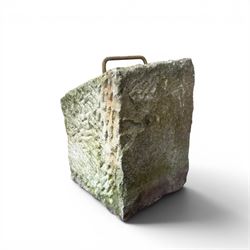 19th century carved tethering stone, square sloping form with iron work loop