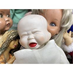 Quantity of vintage and later dolls to include unusual three faced example and further dolls marked C.J, Gloobee, Rosebud etc in three boxes