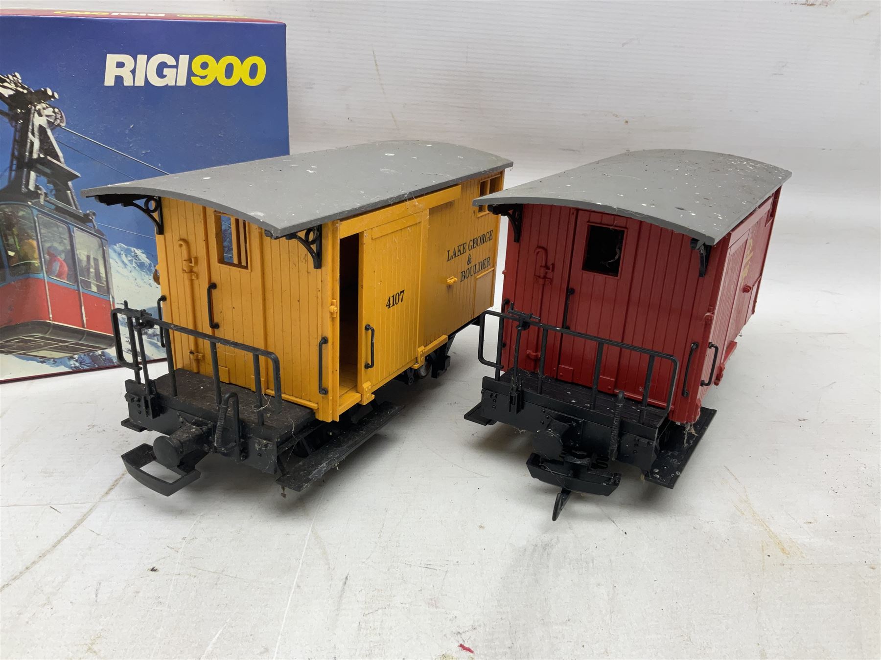 Three LGB (Lehmann Gross Bahn) G scale, gauge 1, rolling stock wagons, comprising two Lake George and Boulder wagons and an Auto Express wagon, together with a LGB passenger coach, other LGB rolling stock and a Lehmann Rigi900 ski lift