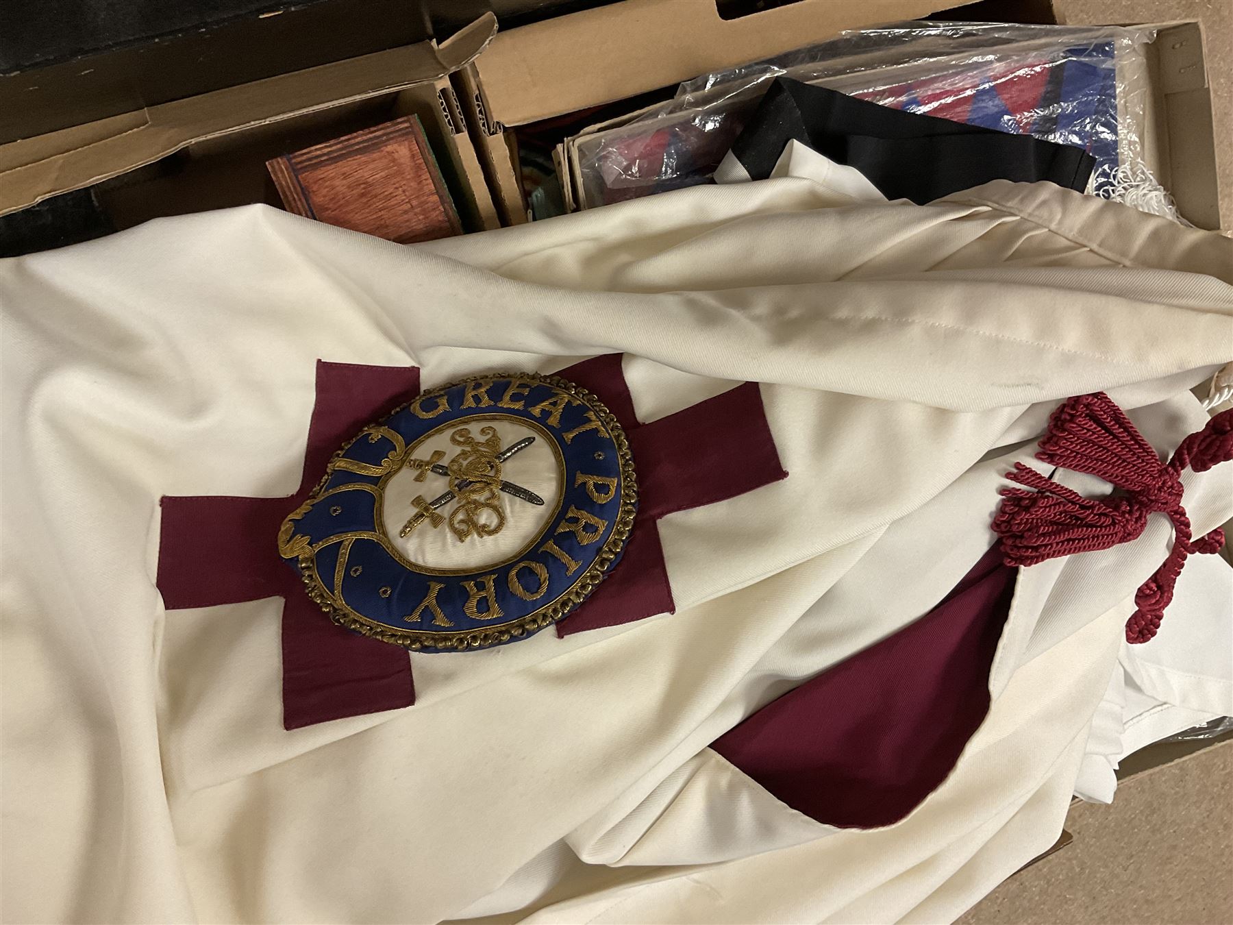 Masonic regalia, including sword, kid leather gloves and apron, Order of Holy Wisdom high priest mitre, etc, contained within briefcases and boxes 