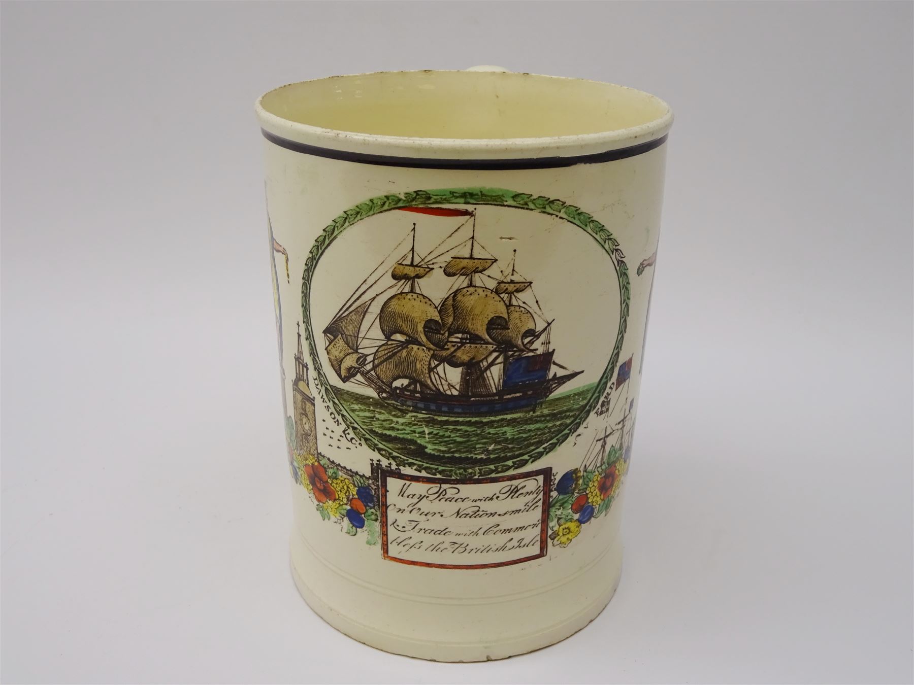 Early 19th century Sunderland Dawson & Co creamware pottery mug, the cylindrical body black transfer printed and polychrome detailed with a circular panel of a three-masted ship flanked by two figures of Peace and Plenty, above a panel containing verse 'May Peace with Plenty on our Nation smile [...]' H15cm D11cm