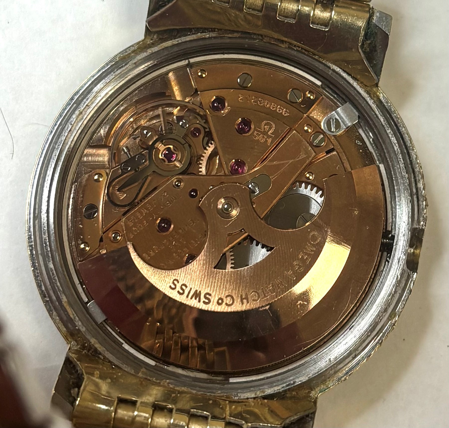 Omega Constellation gentleman's gold-plated and stainless steel automatic chronometer wristwatch, Ref. 168.004, Cal. 561, champagne dial with baton hour markers and date aperture, on Omega gold-plated bracelet, with fold-over clasp 