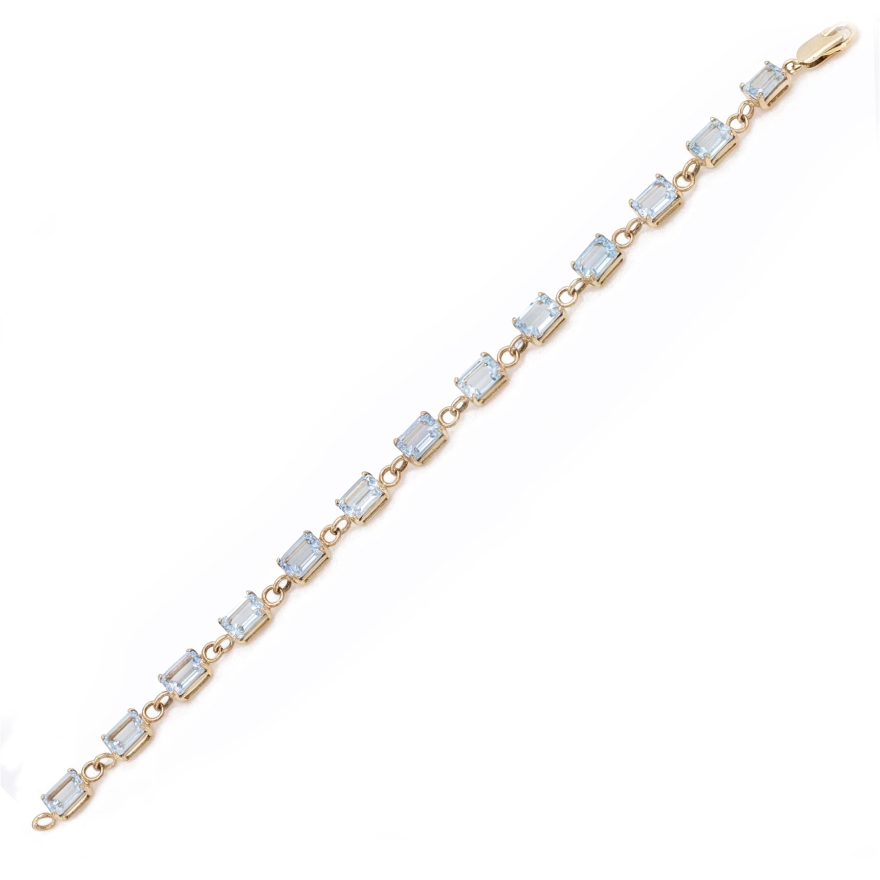 9ct gold Swiss blue topaz bracelet, set with thirteen rectangular cut topaz's, hallmarked