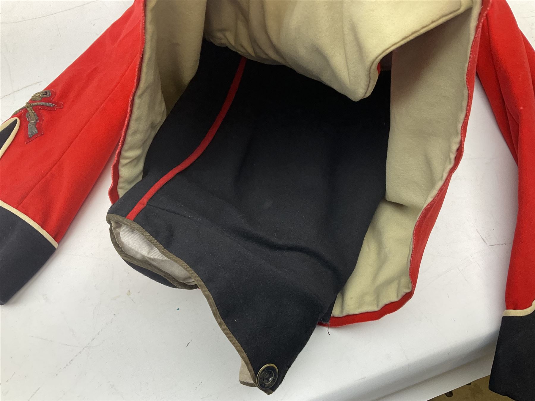 Royal Military College Sandhurst parade uniform with peaked cap and two-piece mess dress, all bearing historic manuscript labels for J.E.A. Baldwin, possibly Air Marshal Sir John Eustace Arthur Baldwin (1892-1975) who served in the British Army 1910-18 & 1944-58 and in the RAF 1918-44.