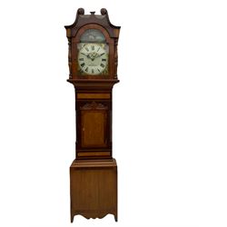 A late Victorian c1860 30-hour chain driven oak and mahogany longcase clock with a swan neck pediment with wooden paterae and a central wooden finial, broad glazed break arch door flanked by turned pillars, on a veneered trunk with canted corners, a short oak door with a flat top, cross banding and applied carved cresting above, on an oak plinth with a shaped integral feet, fully painted dial with Roman numerals and minute track, matching painted spandrels and a depiction of a farm boy with horses in the arch, dial inscribed “Ness, Kirby Moorside”, dial pinned directly to a countwheel recoil anchor movement striking the hours on a bell.  With pendulum and weight.  
Original casemakers label pasted to the backboard of the case.
There were five generations of  the “Ness” family of clockmakers in Kirby Moorside from 1823 -1912.   





