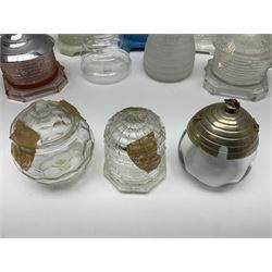 Collection of glass beehive honey pots, to include a blue slag example, milk glass, pink, green, etc together with four white metal examples (16) 