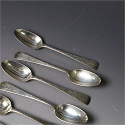 Eleven Victorian silver teaspoons, profusely engraved with floral decoration throughout with family crest to terminal, hallmarked Elkington & Co, Birmingham 1875