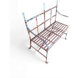 Regency period wrought iron strapwork garden bench, cresting rail with central Scottish thistle motif and flanking pediments, in distressed blue painted finish