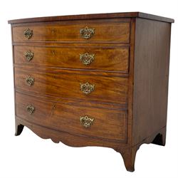 Early 19th century inlaid mahogany bow-front chest, figured top with crossbanding and boxwood stringing, fitted with four graduating cock-beaded drawers, pierced brass handle plates, shaped apron on out-splayed bracket feet