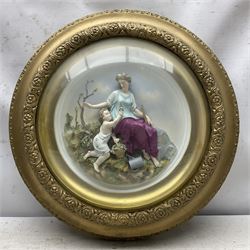 Set of four early 20th century Continental bisque plaques, each of circular form, modelled in high relief as the Four Seasons personified, within gilded circular frames under convex glass, overall D44.5cm