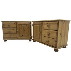 Pair of traditional pine bedside or side cabinets, fitted with three drawers and single cupboard, on compressed bun feet