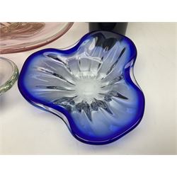 Two Whitefriars glass jugs, together with a Swedish Pukeberg art glass vase and three art glass bowls, including large pink example, some signed to base, tallest H30.5cm