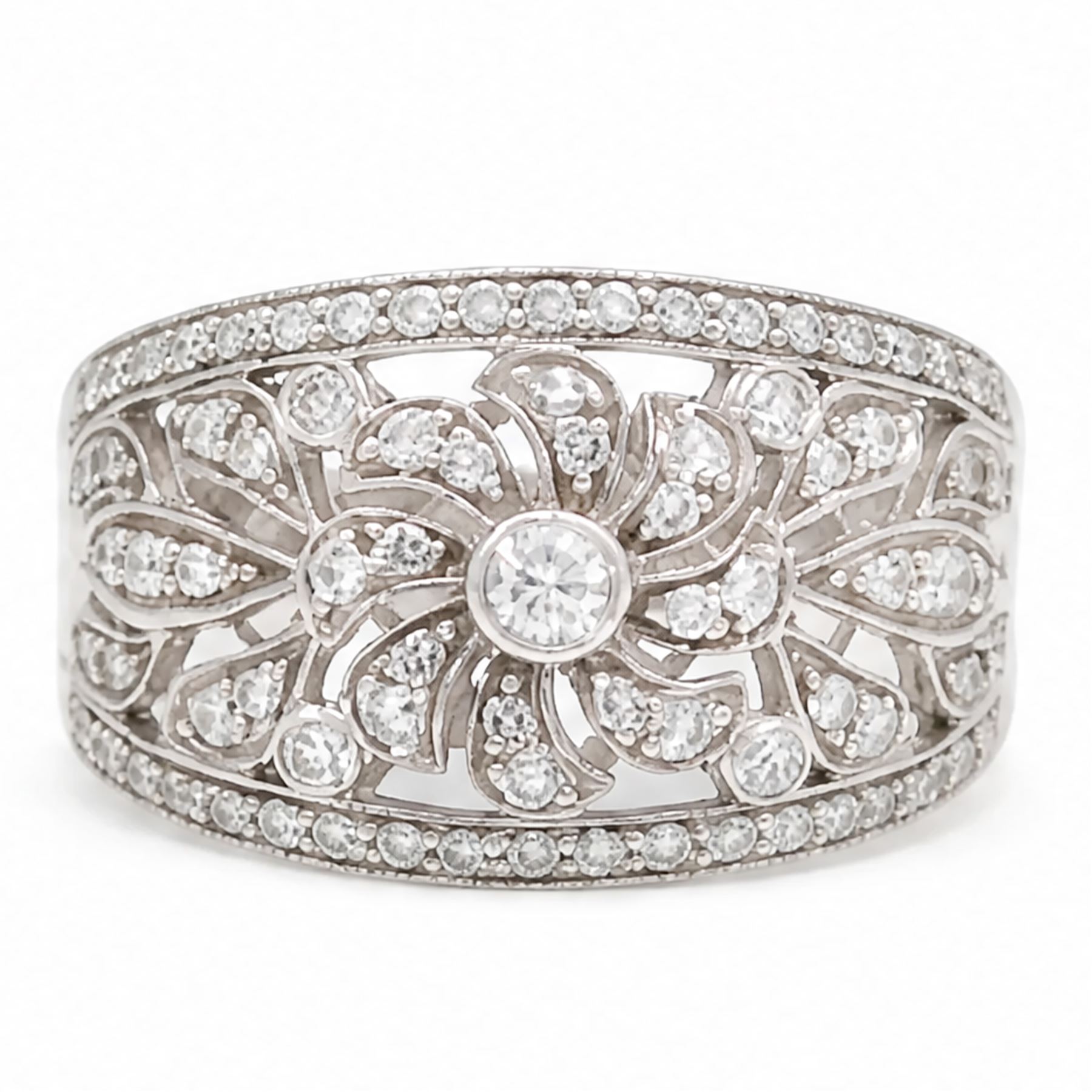 18ct white gold diamond floral ring, milgrain and pierced design set with round brilliant cut diamonds, Edinburgh 2017